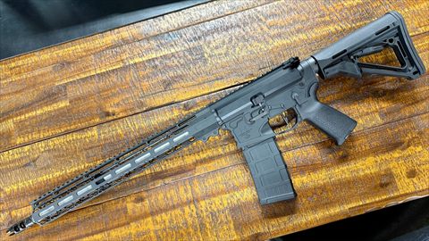 Grey Pathfinder Defense AR-15 with a long handguard