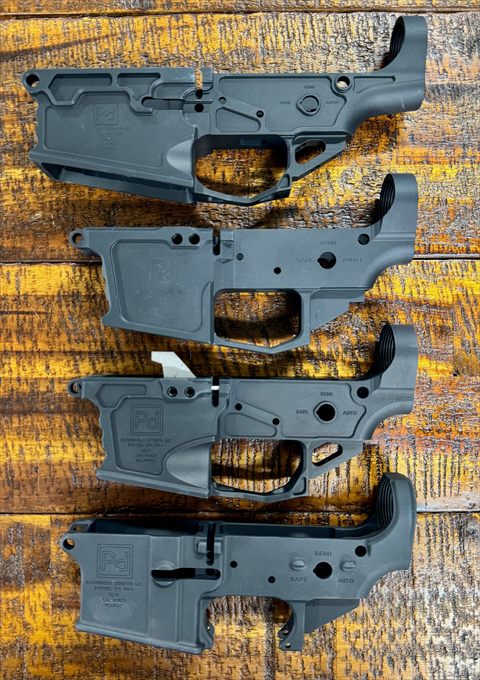 Four Pathfinder Defense lower receivers, billet and forged